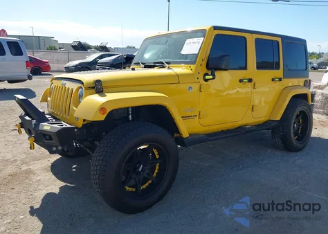 2015 Jeep Wrangler Unlimited Sahara from USA, damaged, VIN 1C4BJWEG1FL561054